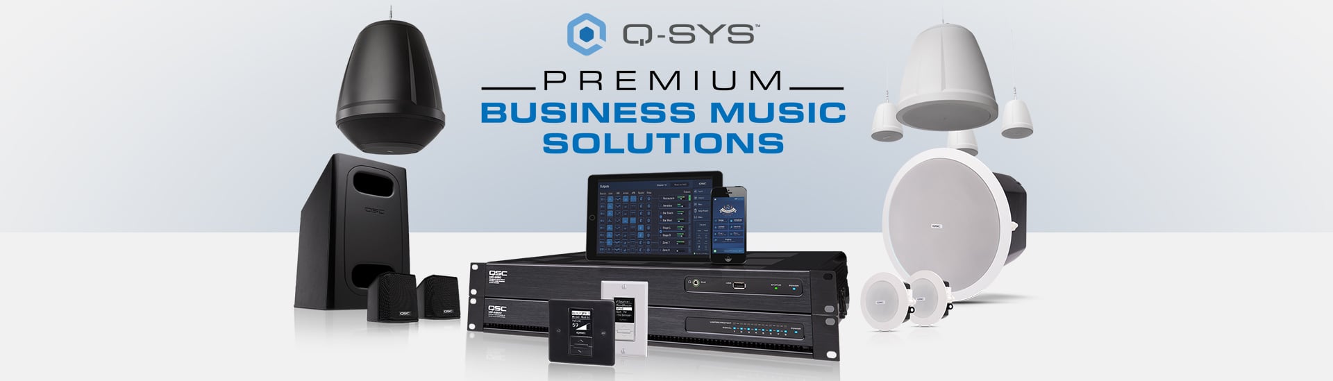 Q-SYS硬件、外围设备和扬声器合照，上面的文字是：“Premium Business Music Solutions”